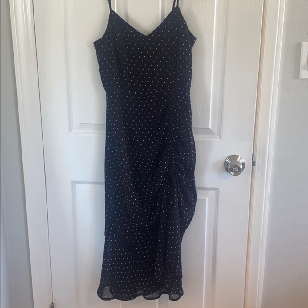 Black polka dot dress with slit